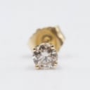 A natural brilliant earring made of 14 kt gold 0.16 ct