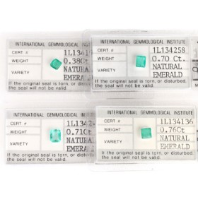 Four unset emeralds totaling 2.55 ct. with IGI certificates. (4)