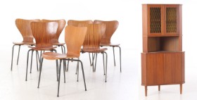 Teak corner cabinet and seven shell chairs (1+7)