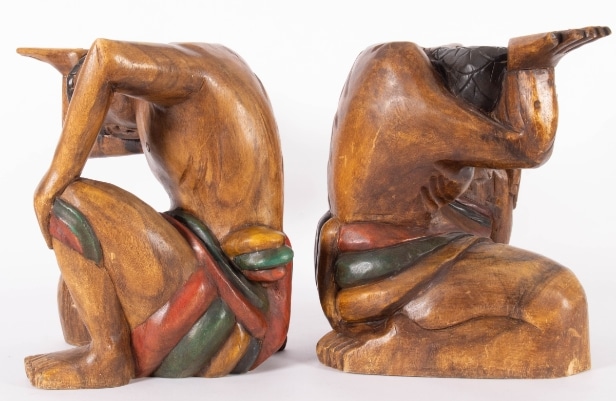 Pair of carved Balinese wooden figures (2)