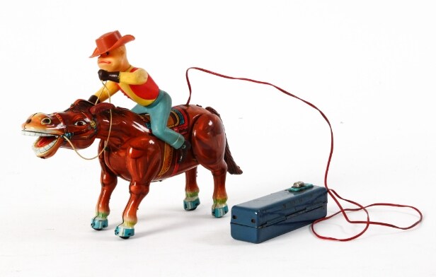 TM Modern Toys/Masudaya. Western Ranger. Batteridrevet galoperende cowboy, 1963-1967