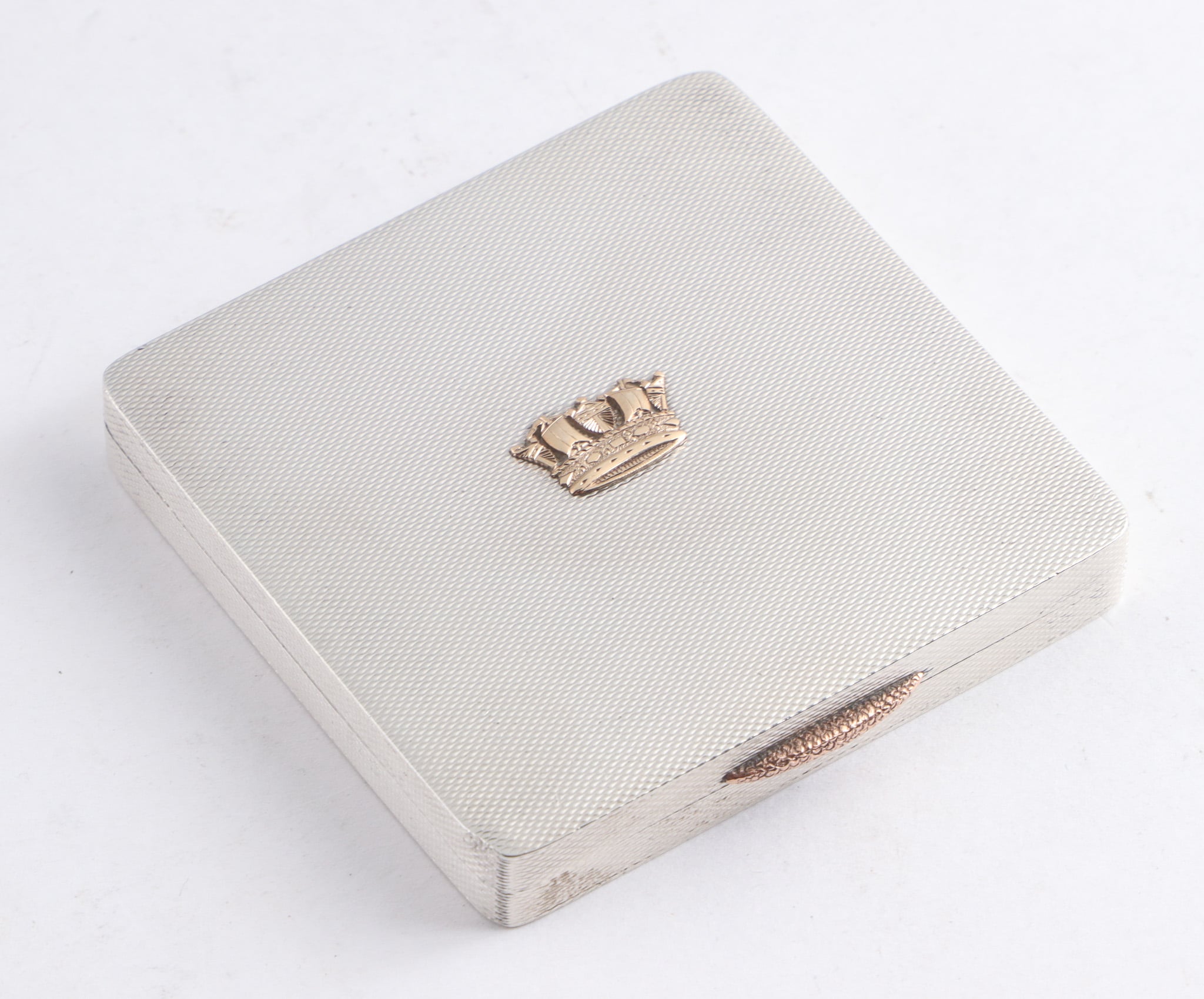 W.H. Manton. Sterling silver case adorned with gold crown, Birmingham 1943