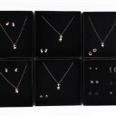 A collection jewellery sets of gold-plated sterling silver. (63)