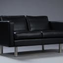 Stouby. Two-person sofa, model Boston, black leather.
