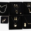A collection jewellery sets of gold-plated sterling silver. (63)