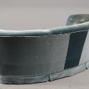 Sofa i bananform med lys blå velour