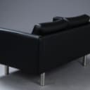 Stouby. Two-person sofa, model Boston, black leather.