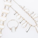 Volmer Bahner: Jewelry set with white enamel. (3)