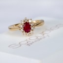 Scrouples. 'Diana' ruby ??and brilliant rosette ring in 14 kt. gold, total 0.22 ct.