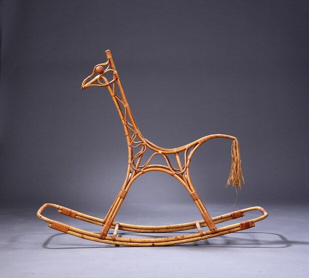 Kay Bojesen, attributed. The rocking giraffe made of bamboo, eyes made of beech wood, tail tassel made of bast
