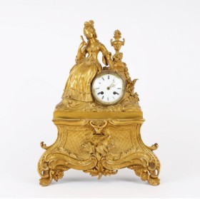 French mantel clock of gilded bronze