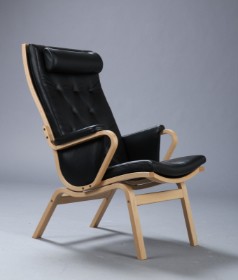 Finn Østergaard for Stouby. High armchair, 'Albert de Luxe', oak, black Florence leather.