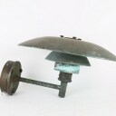Poul Henningsen for Louis Poulsen: Outdoor wall lamp made of patinated copper.