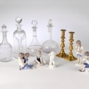 Holmegaard, Bing & Grondahl and others. A collection of porcelain figurines, glass decanters etc. (11)