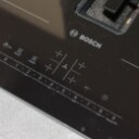 Nolte Küchen. Komplet køkken med køkkenø, bordplade i skifer m/ underlimet vask, samt fuld Bosch hvidevarepakke.