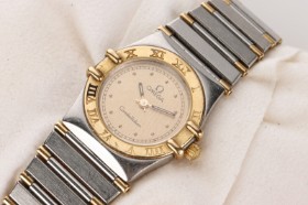 Omega Constellation. Damearmbåndsur i stål og 18 kt. guld