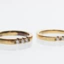 Pair of gold-plated silver alliance rings with brilliants, 0.09 and 0.15 ct. (2)