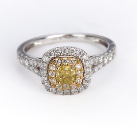 Diamond ring in 18 kt. white gold with Fancy Intense Yellow diamond, 0.89 ct.