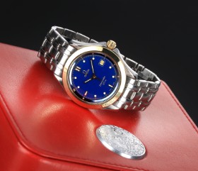 Omega 'Seamaster 120M'. Men's watch in 18 kt. gold and steel with blue disc, approx. 1991