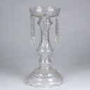 A pair of Empire style candlesticks, a silver candlestick, a glass candlestick (4)