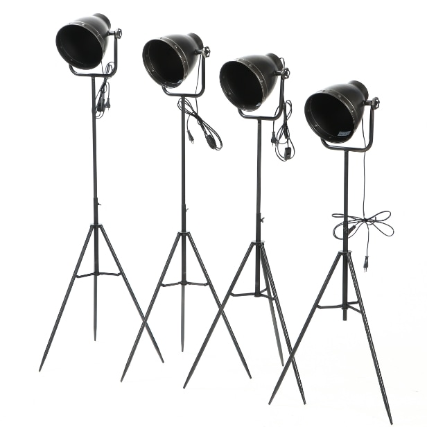 Four floor lamps in black lacquered metal. (4)