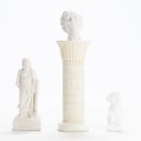 Three plaster figures and a pedestal, 20th/21st century (4)