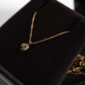 Georg Jensen. Jacqueline Rabun. 'Mercy' necklace with diamond pendant in 18 kt. gold in GJ box.