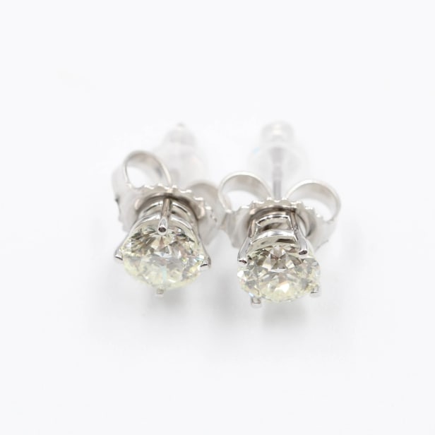 Pair of natural brilliant earrings in 14 kt gold, 1.00 ct. (2)
