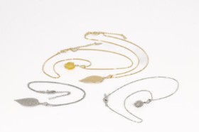 Pure Leaf. Four necklaces plated with 18 kt. gold and white gold (4)