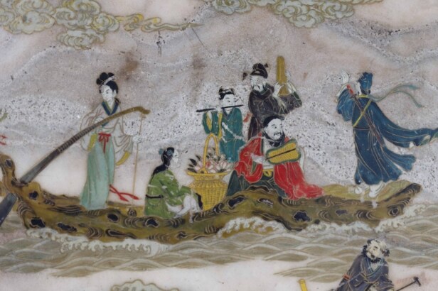 Chinese two-sided porcelain painting mounted in a carved wooden frame on a foot