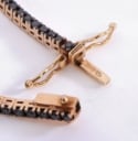 Tennis bracelet in 18 kt. red gold with black diamonds, 2.29 ct.