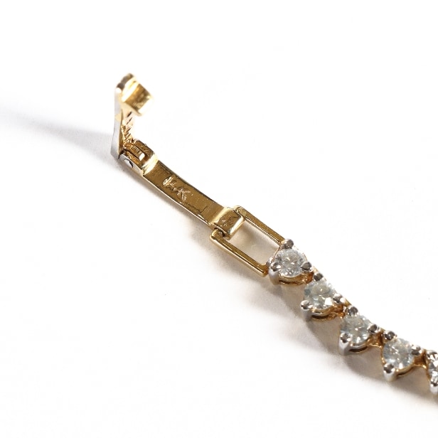 Diamond necklace in 14 kt. gold with 101 diamonds, clasp with 7 diamonds