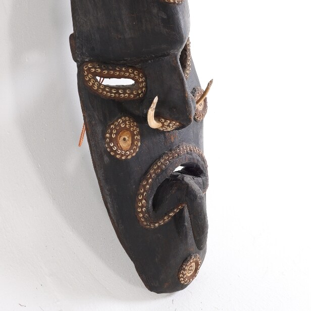 Oceania: Mask, Sepik of carved, partially painted wood with ...