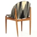 Danish furniture manufacturer 1950/60s: Oak chair with shell-shaped seat and back