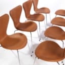 Arne Jacobsen. A set of 8 chairs 'Seven', model 3107, Vacona cognac aniline leather (8)