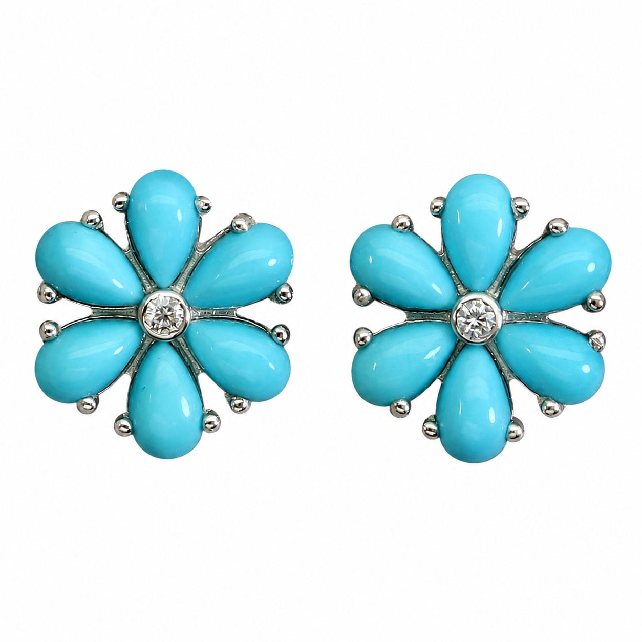 Earrings in rhodium-plated sterling silver with numerous turquoises