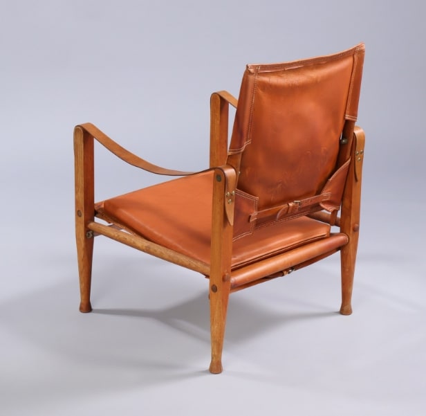Kaare Klint. Safari chair with seat cushion in cognac leather.