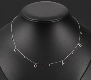 Diamonds by Frisenholm. Love halskæde af 18 kt. hvidguld med diamanter