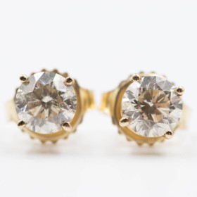 Pair of brilliant-cut earrings in 14 kt gold, 1.10 ct. (2)