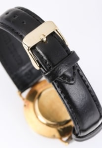 Jaeger-LeCoultre. 'Vogue'. 18 kt. gold wristwatch with black Jaeger-LeCoultre. 'Vogue'. 18 kt. gold wristwatch with black