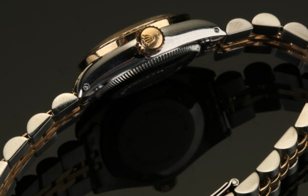 Rolex dameur i 18 karat guld/stål med Diamanter