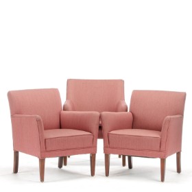 Tylstrup. Three upholstered armchairs (3)