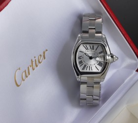 Cartier 'Roadster'. Midsize women's watch in steel with silver dial, 2000s