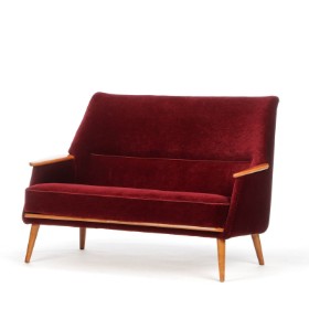 Small two-person. sofa, upholstered in red velour, approx. 1950s/1960s