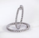A pair of brilliant-cut diamond hoop earrings in 18 kt. white gold, 0.70 ct. (2)