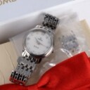 Omega 'De Ville Prestige'. Dameur i stål med brillantbesat perlemorsskive - boks + cert. 2019