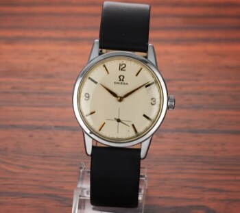 Omega. Vintage herreur i stål med lys skive, ca. 1960