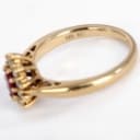 Scrouples. 'Diana' ruby ??and brilliant rosette ring in 14 kt. gold, total 0.22 ct.