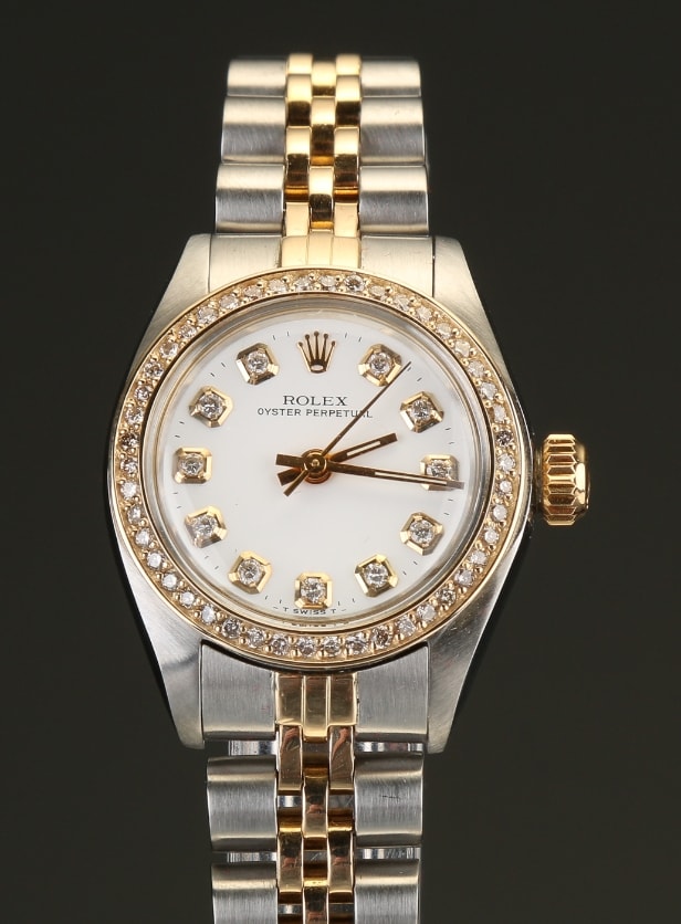 Rolex dameur i 18 karat guld/stål med Diamanter