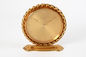 Rosemont, Geneva. Table clock in brass.